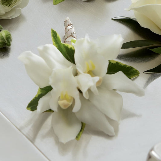 White Mini Cymbidium Boutonniere –  Flowers The Bouquet Of Roses, Tampa FL